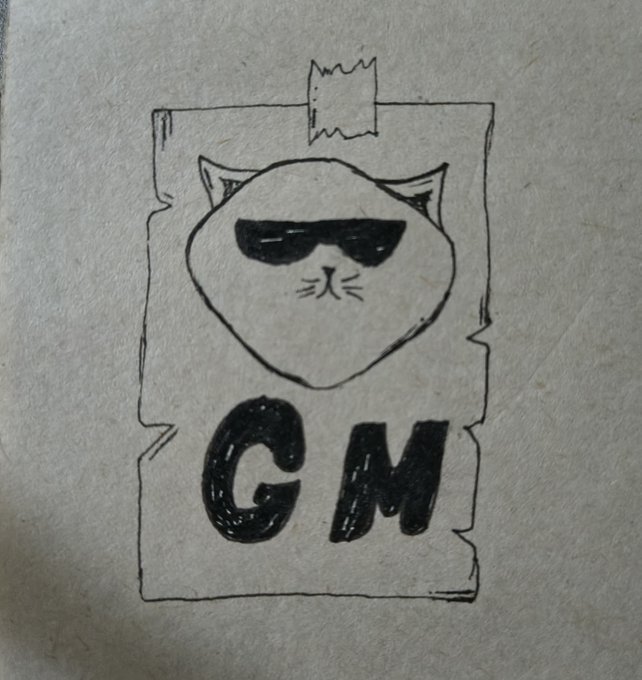 A hand-drawn sketch on white paper showing a cat wearing sunglasses on a poster taped to a wall, with the letters 'GM' written below it.