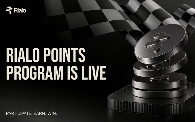 The image announces "RIALO POINTS PROGRAM IS LIVE" with the tagline "PARTICIPATE. EARN. WIN." featuring stacked Rialo-branded coins against a checkered racing flag backdrop, promoting Rialo's newly launched points program where users can claim 20 points and earn rewards as part of the platform's ecosystem ahead of its 2026 mainnet launch following its $20M raise.