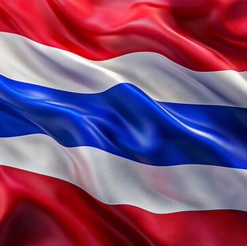 The image shows the flag of Thailand waving, which relates to the news about Thailand's SEC proposing domestic crypto ETF regulations with Bitcoin and Ethereum as initially eligible assets.