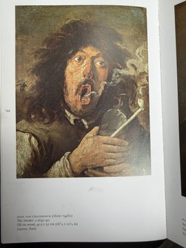 A photograph of an art book page showing a baroque painting of a man smoking a pipe, with caption text identifying it as 'FRANS HALS (c. 1580-1666), THE SMOKER, oil on canvas' from 'The Barber Institute of Fine Arts'.