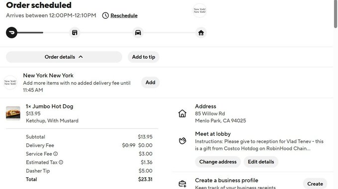 This image shows a Costco food delivery order confirmation for a "1× Jumbo Hot Dog" with ketchup and mustard ($13.95) being delivered to Vlad Tenev at 85 Willow Rd, Menlo Park, CA 94025, with a total of $23.31 and a note specifying "this is a gift from Costco Hotdog on RobinHood Chain..." The order details directly support the post's joke about Robinhood CEO Vlad Tenev being gifted a Costco hot dog via delivery.