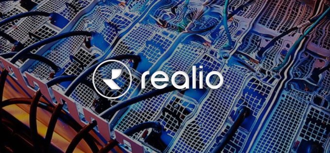 A logo for 'realio' displayed in white text with a circular icon, overlaid on a blue-tinted image of server racks and network cables in a data center.
