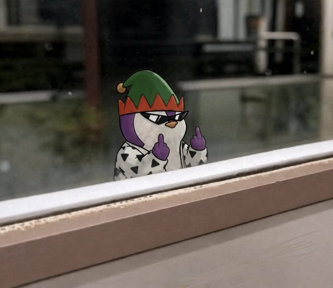 A sticker of a penguin character wearing an elf hat and sunglasses, giving middle fingers, placed on a window.