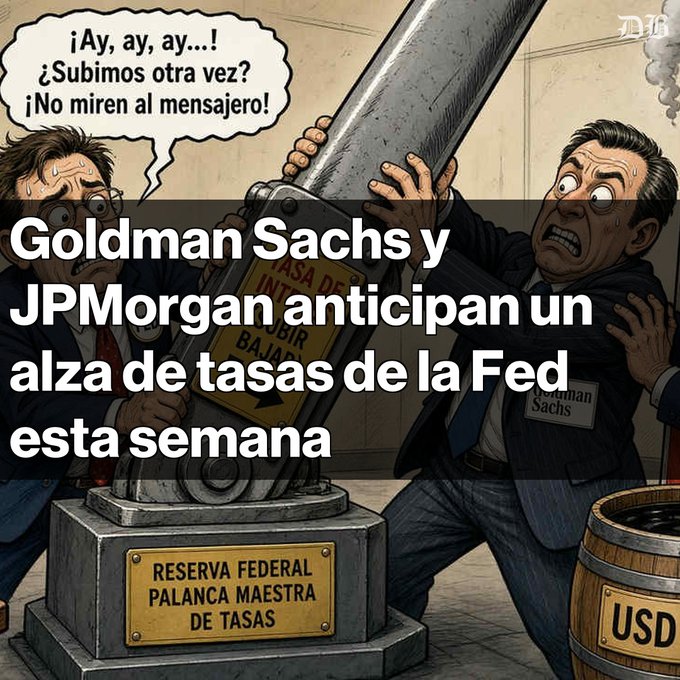 An illustrated meme depicts two men struggling to operate a cannon-like machine, with Spanish text reading 'Goldman Sachs y JPMorgan anticipan un alza de tasas de la Fed esta semana' and labels including 'RESERVA FEDERAL PALANCA MAESTRA DE TASAS' and 'USD'.