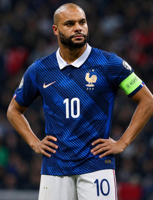 A French national team player wearing the number 10 jersey and captain's armband stands with hands on hips, looking disappointed during what appears to be a UEFA Euro Qualifiers match. The "LOL" caption humorously contrasts the serious, dejected expression of the player, possibly referencing a frustrating moment in the game.