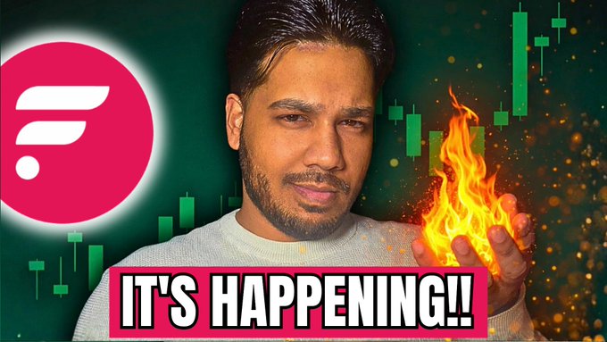 A man holds a fireball in his hand with bold text "IT'S HAPPENING!!" displayed below, alongside the Flare (FLR) logo and green candlestick chart graphics, visually promoting the video's announcement of Flare's 20X burning mechanism going live.