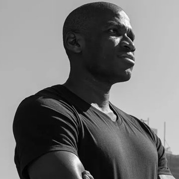 A black-and-white close-up portrait of a man in a dark T-shirt, gazing thoughtfully into the distance, likely depicting Arthur Hayes referenced in the accompanying post about his bullish Ethereum outlook.
