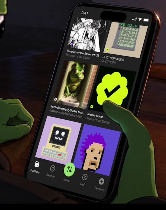 A person wearing green gloves holds a smartphone displaying a crypto/NFT app interface showing various digital collectibles including 'Templars of the Storm #1025', 'QUOTRON #1528', 'itsWednesdayMyDudes Mar...', 'Checks Hood', and others, with bottom navigation tabs for Portfolio, Explore, Swap, DeFi, and Rewards.