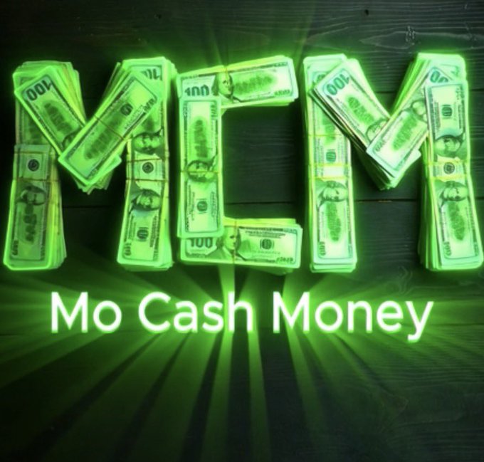 A neon green-tinted image showing stacks of $100 bills arranged to spell 'MCM', with the text 'Mo Cash Money' displayed below in a glowing green font against a wooden plank background.