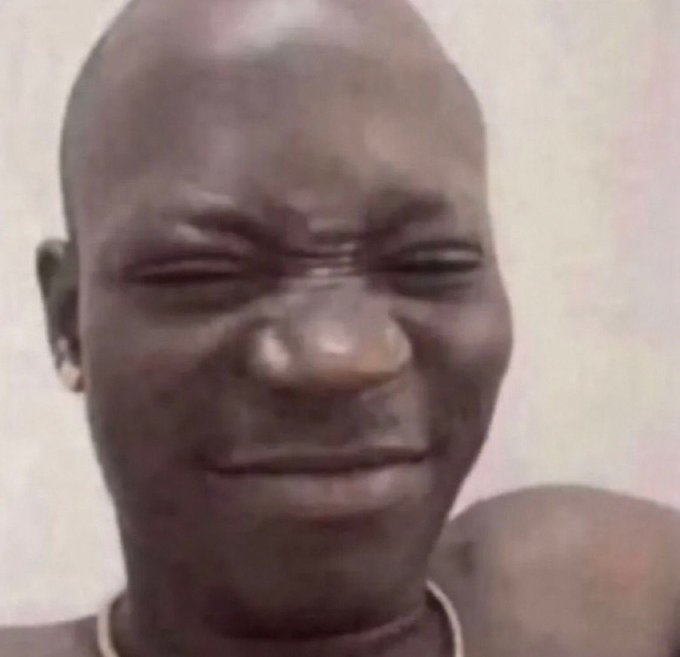 A close-up photo of a smiling young boy with a shaved head, paired with a humorous caption about a beginner trader with only $10 lamenting the fees on their FOMO trading account—the boy's gleeful expression playfully mirroring the "fear of missing out" theme.