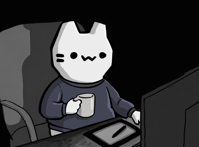 A cartoon white cat character in a blue sweater holds a coffee mug while working at a computer setup with a graphics tablet, fitting the "gm" (good morning) NFT enthusiasts vibe. The cozy, late-night creator aesthetic matches the casual crypto community greeting.