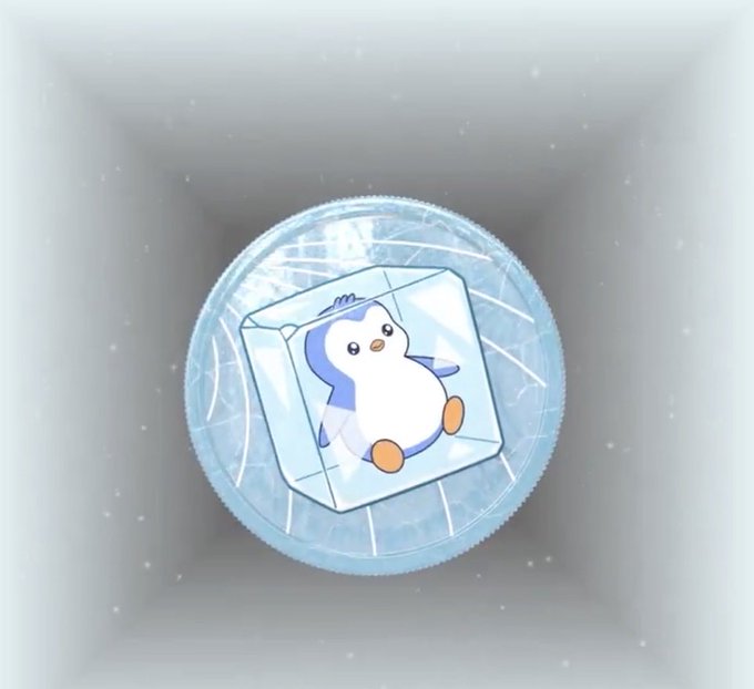 The image features a cute cartoon penguin sitting inside an ice cube. The penguin appears to be enjoying its time in the icy environment. Below the penguin, there's text that reads "Revoking open approvals is so important we made a Soulbound token for it! This takes just a few min and will help prevent phishing scams trying to steal your Pudgy Penguins Head over to @RevokeCash and clean up your approvals, great way to start the week!". The image seems to be promoting an idea related to online security or privacy.
