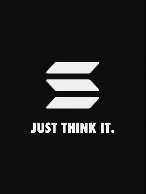 A black poster displays three white stacked parallelogram shapes above the text "JUST THINK IT."