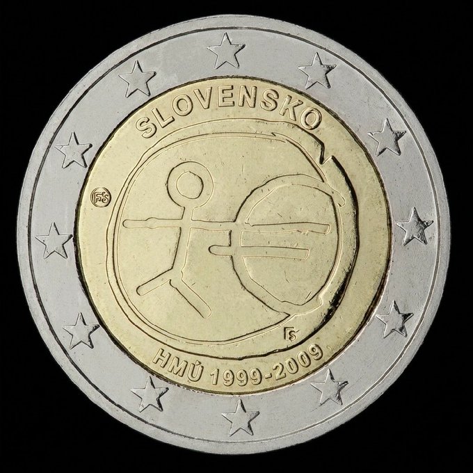 Slovak commemorative 2 euro coin featuring the inscription 'SLOVENSKO' and 'HMÚ 1999-2009', depicting a stylized figure with a shield on its national side.