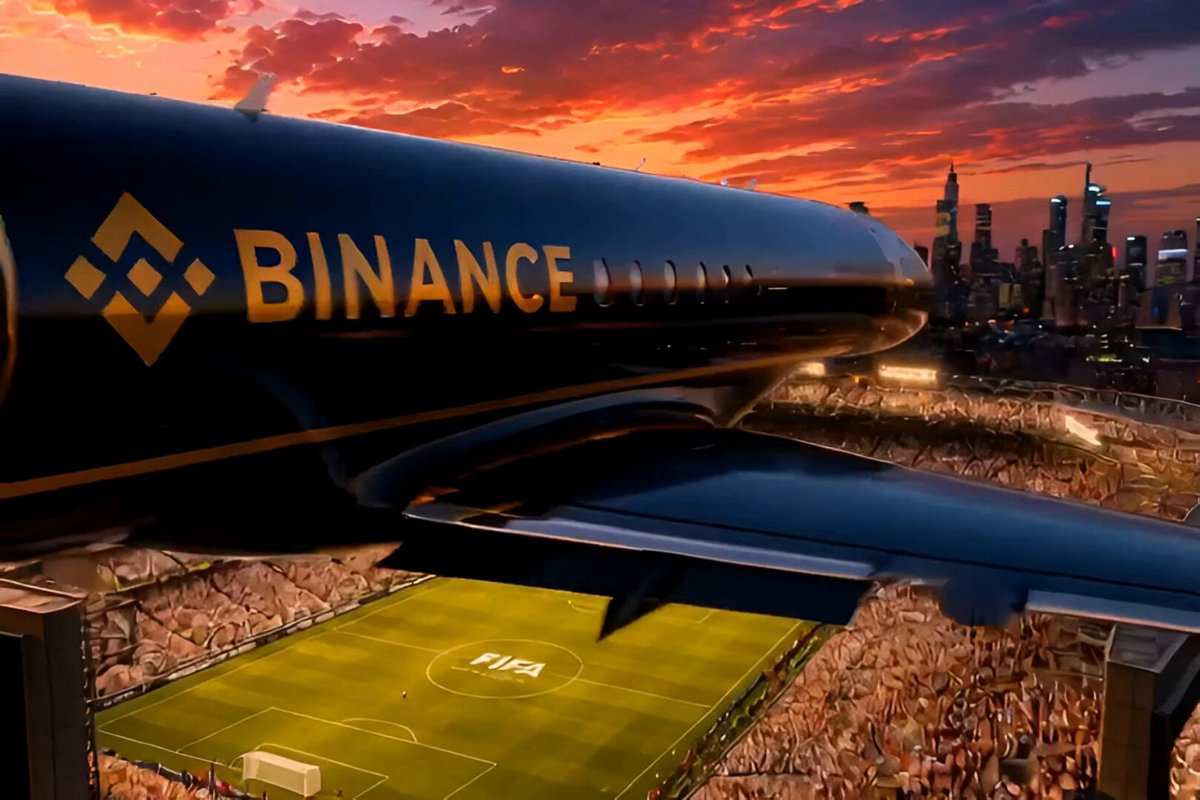 The image features a large airplane with the word "Binance" written on its side, flying over a soccer field at dusk. The sky has a beautiful sunset backdrop, creating an atmosphere of celebration for the FIFA World Cup. A crowd can be seen in the background, indicating that this is likely taking place during the event. The image also includes text related to the post about celebrating the FIFA World Cup and web3 technology.