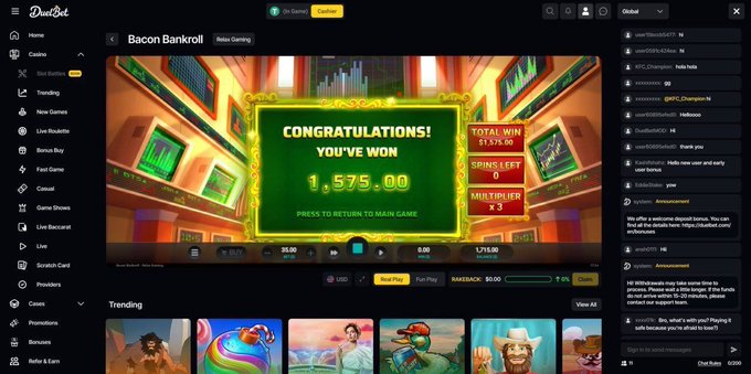 A screenshot of the DeanBet online casino website displaying a 'CONGRATULATIONS! YOU'VE WON 1,575.00' pop-up over a 'Bacon Bankroll' slot game, with chat and trending games visible.