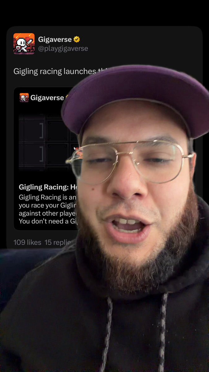 The image shows a man wearing glasses, a black hoodie with a purple baseball cap, and a beard. He has his mouth open as if he's speaking or laughing. The caption of the image reads "get your Giglings ready... Gigling racing goes live tomorrow June 4th in @playgigaverse". This post is about an upcoming event related to the Giglings racing team.
