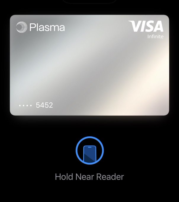 The image displays a digital Plasma Visa Infinite card ending in 5452 on a mobile device screen with a "Hold Near Reader" prompt for contactless payment, illustrating the post's message that the user exclusively uses the Plasma card for its benefits like zero FX fees and 4% cashback.