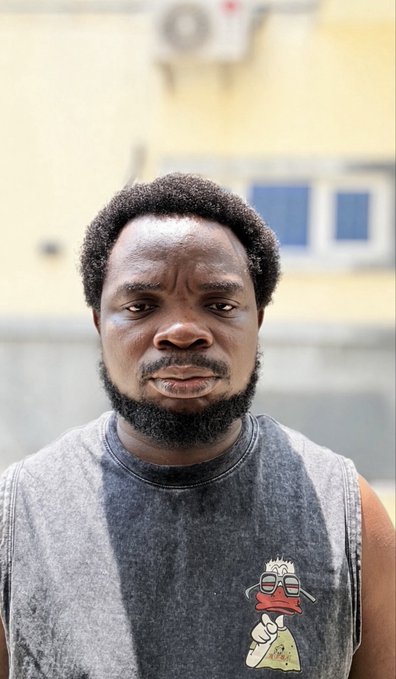 A man with a full beard and afro stares seriously into the lens, his hair visibly grown out—he's growing his hair out alongside $GRAM's journey to its all-time high.