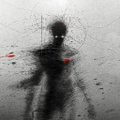 Dark, sketchy silhouette of a horned demon figure with two glowing red eyes standing in a shadowy, grunge-textured environment.