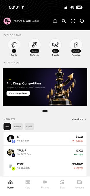 The image displays the Tria app's home screen featuring a "PnL Kings Competition" banner with $12,000 in rewards, along with market data showing LIT down 15.83% at $3.72, TRUMP up 1.13% at $2.02, and PONS down 7.26% at $0.4972. This relates to the post as it showcases the Tria platform the author is exploring, highlighting both its gamified competitions and its market tracking features that align with a fintech-focused ecosystem.