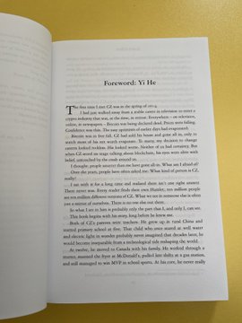 An open book is displayed showing a page titled "Foreword: Yi He," which appears to be from the book "Freedom of Money" referenced in the post, featuring text about cryptocurrency history and conviction during Bitcoin's early challenges.