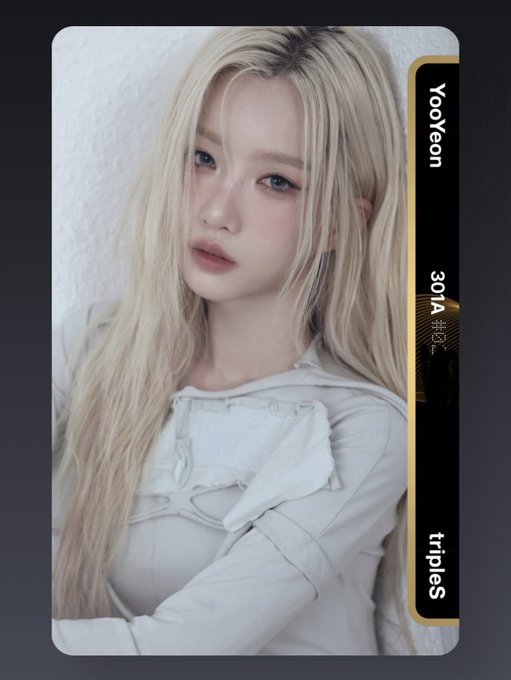 A photo card featuring a blonde-haired woman with the text 'Yooyeon', '301A', 'triples', and what appears to be Korean characters on the right side.
