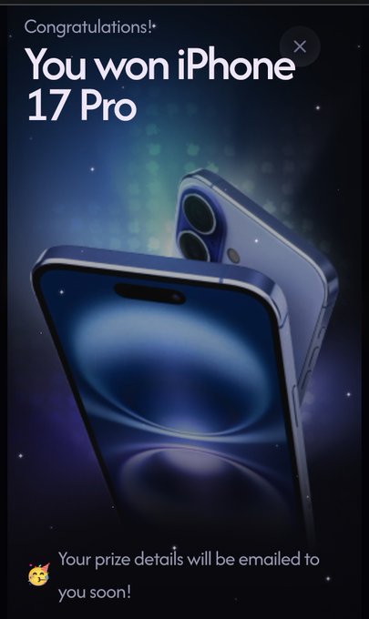 The image features an iPhone 17 Pro displayed against a dark background with stars scattered throughout. The phone has won an award for being the "iPhone of the year" and is shown in two different sizes - one larger and one smaller, both placed on a table or countertop. The text in the image reads "Congratulations You Won iPhone 17 Pro", indicating that someone has won this particular iPhone model as the best of the year.