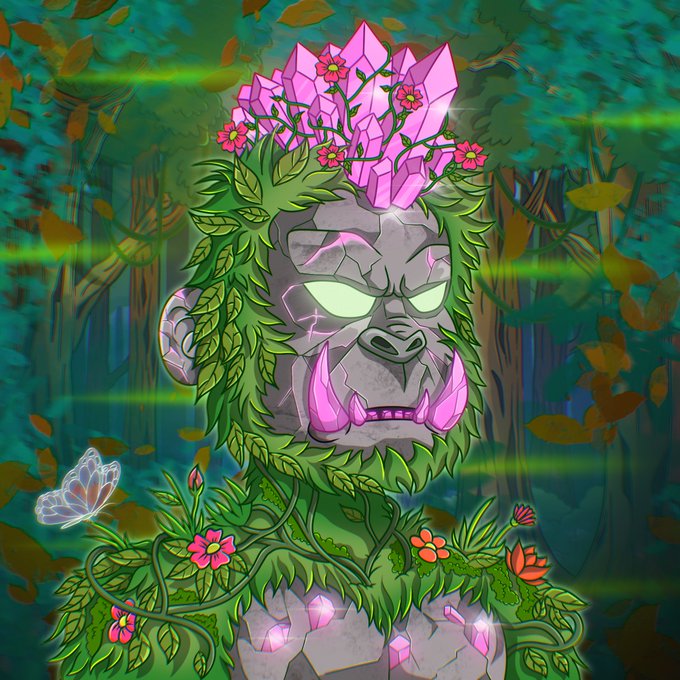 The image features a fantastical, anthropomorphic gorilla character with intricate and colorful facial hair wearing a rock-like headpiece decorated with flowers. The gorilla's face also displays an expression of anger or frustration. Surrounding the gorilla are various plants and flowers in different shades of green and pink, enhancing the whimsical atmosphere of the scene. 
The caption provided above the image highlights that the artist behind this creation is TateOnChain. This indicates that the artworks are digital illustrations, specifically created for the Tate On Chain platform. These digital artwork pieces can be easily shared on social media or other online platforms to promote and showcase the talent of the artist.