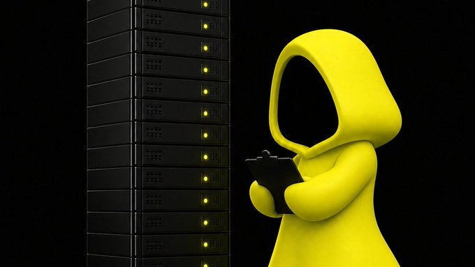 A 3D render of a faceless yellow hooded figure holding a clipboard, standing next to a tall stack of black server units with glowing yellow indicator lights against a dark background.