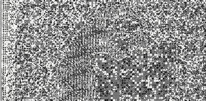 An abstract black and white pixelated pattern resembling static or QR code.
