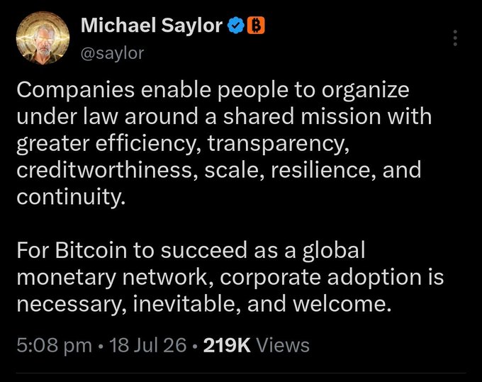 A tweet from Michael Saylor (@saylor) with 219K views posted on July 18, 2026, stating that companies enable people to organize around a shared mission, and that corporate adoption is "necessary, inevitable, and welcome" for Bitcoin to succeed as a global monetary network—reinforcing his well-known pro-Bitcoin corporate adoption stance.