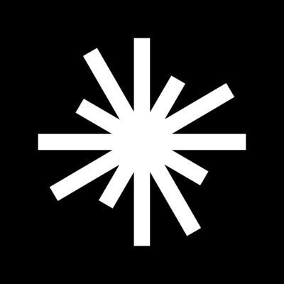 A white asterisk-like burst or star logo on a black background.