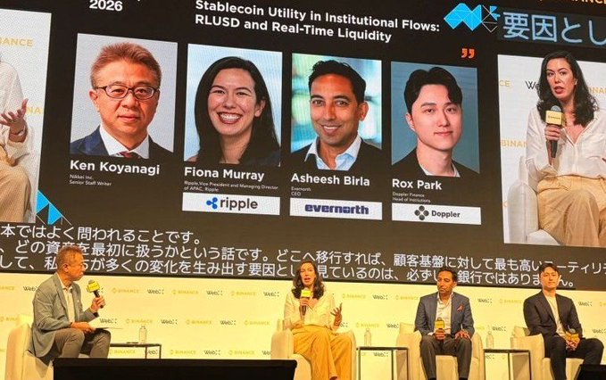 The image shows a panel discussion at WebX 2026 in Japan, featuring Ken Koyanagi (Senior Staff Writer), Fiona Murray (Managing Director of APAC at Ripple), Asheesh Birla (CEO of Evernorth), and Rox Park (Doppler's Head of Finance), discussing "Stablecoin Utility in Institutional Flows: RLUSD and Real-Time Liquidity," which aligns with the post about Ripple's presence at the conference.