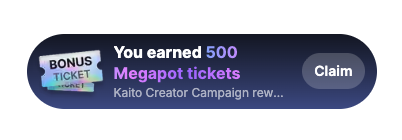 A dark blue notification banner displays "You earned 500 Megapot tickets" as a reward from the Kaito Creator Campaign, featuring a bonus ticket icon and a "Claim" button to collect the winnings.