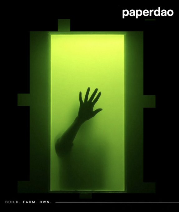A poster featuring a green-lit rectangular tank with a hand silhouette pressing against it from inside, labeled 'paperdao' at the top and 'BUILD. FARM. OWN.' at the bottom.
