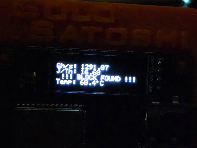 An OLED display shows a Bitcoin mining screen reading 'GV/S: 1291.07', 'J/TH: 16.68', 'BLOCK FOUND !!!', and 'Temp: 68.4°C'.