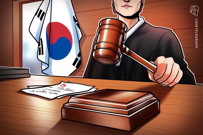 Cartoon-style illustration of a person in traditional attire holding a judge's gavel in front of the South Korean flag, watermarked 'Cointelegraph'.