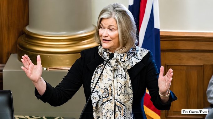 Senator Cynthia Lummis speaks passionately at a podium with the Wyoming state flag behind her, as indicated by the "The Cheyenne Times" watermark, pushing forward the CLARITY Act aimed at protecting crypto users if exchanges collapse—a critical measure following the FTX collapse that would benefit holders across the space, including $XRP investors through Ripple's established structure.