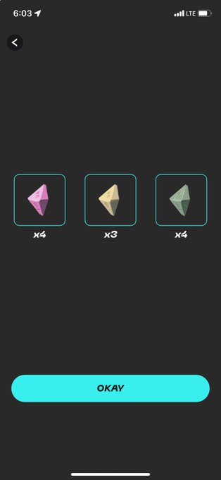 The image shows a phone screen displaying three different icons, each representing a step in a treasure hunt game. The first icon is a pink pyramid, the second is a green pyramid, and the third is a blue pyramid. Below these icons are text that reads "My loot for today #stepn #stepngo". This suggests that the user has found their first piece of treasure from the game and is now ready to continue on with the next steps in the hunt.