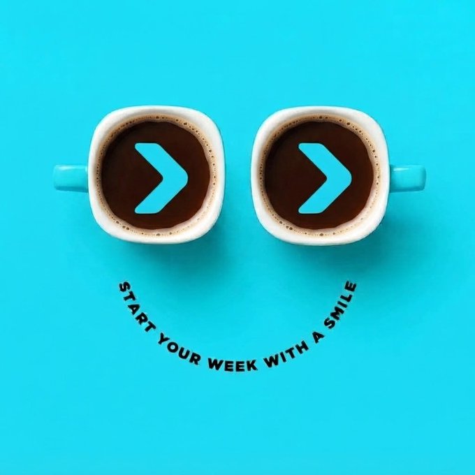 Two coffee cups viewed from above have arrows in the foam creating a smile face design, with text reading 'START YOUR WEEK WITH A SMILE' on a turquoise background.