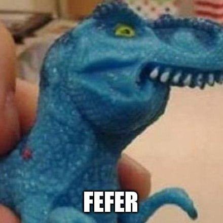 A blue plastic dinosaur toy is held in someone's hand, with the caption "FEFER" displayed at the bottom, visually promoting the meme-style $FEFER token that the post claims is trading at a 12M market cap with a 6x gain.