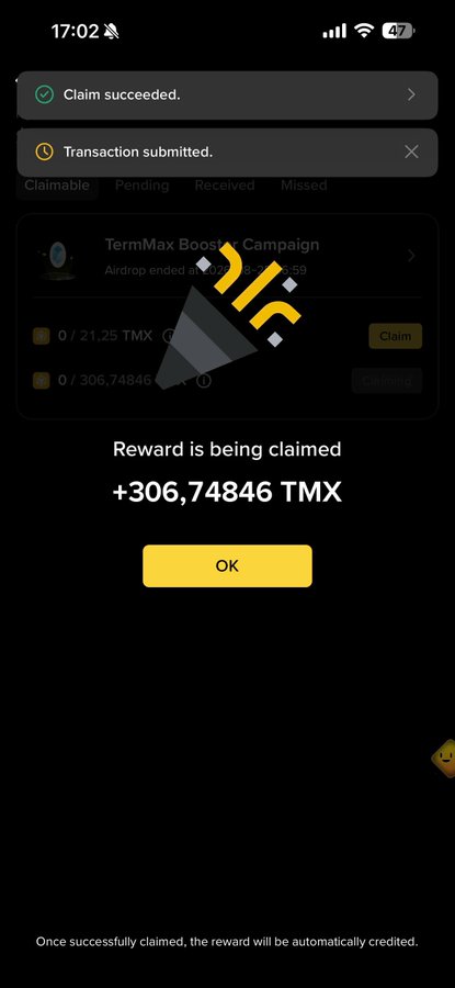 A mobile app screenshot showing a successful claim with notifications 'Claim succeeded.' and 'Transaction submitted.' The screen displays 'Reward is being claimed +306.74846 TMX' from a TermMax Booster Campaign, with an OK button below.