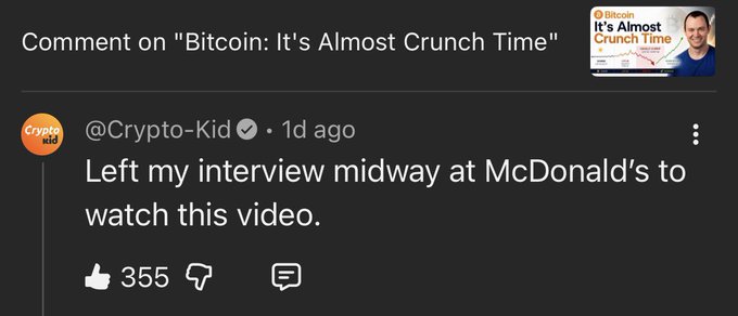 A YouTube comment by @Crypto-Kid on "Bitcoin: It's Almost Crunch Time" reads: "Left my interview midway at McDonald's to watch this video." The comment has 355 likes, and the joke caption notes that despite potentially losing a McDonald's job, the commenter prioritizes knowing where Bitcoin will bottom over employment.