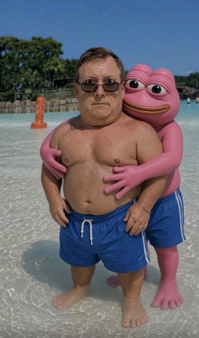 An older shirtless man in blue swim trunks stands in shallow water while a pink Barney-like character hugs him from behind.