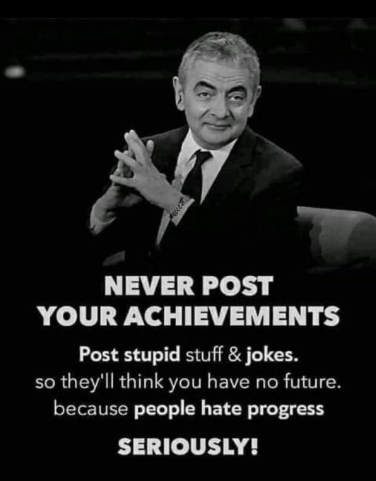 A motivational graphic featuring Rowan Atkinson as Mr. Bean in a black suit, clapping his hands, with white text reading 'NEVER POST YOUR ACHIEVEMENTS - Post stupid stuff & jokes. so they'll think you have no future. because people hate progress SERIOUSLY!'.