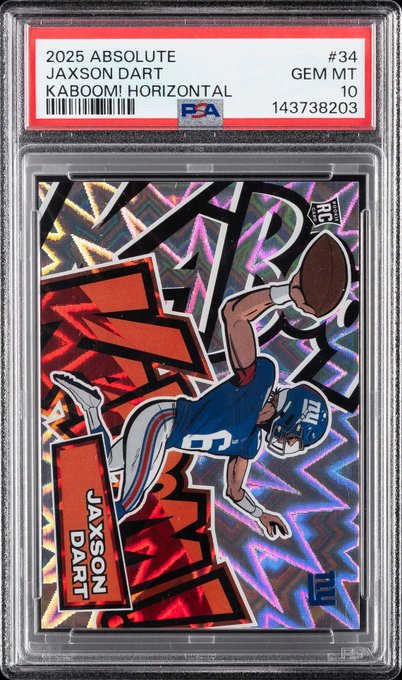 A 2025 Panini Absolute Kaboom! Horizontal PSA 10 Gem Mint rookie card of Jaxson Dart (#34), featuring the New York Giants quarterback reaching for a football against a vibrant red, black, and holographic geometric background, tying into the post's reference to "DARTs" on the Trove marketplace.