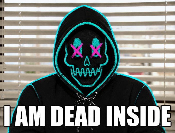 A person wearing a black hoodie with a teal skull mask design featuring pink X eyes, captioned 'I AM DEAD INSIDE'.