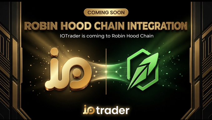 A "Coming Soon" promotional graphic featuring the IOTrader and Robin Hood Chain logos side by side, with the text "ROBIN HOOD CHAIN INTEGRATION" and "IOTrader is coming to Robin Hood Chain" announcing the upcoming partnership between the two platforms for decentralized trading.