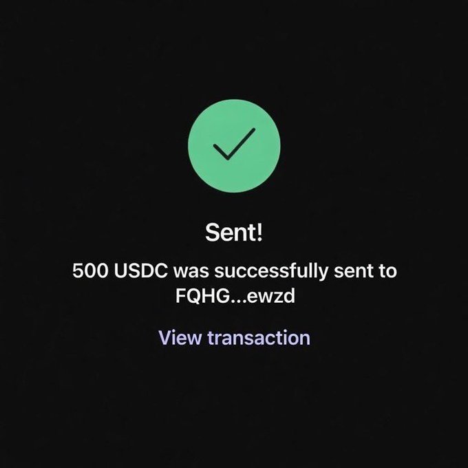 A digital transaction confirmation screen with a green checkmark indicating 'Sent!' and the message '500 USDC was successfully sent to FQHG...ewzd', with a 'View transaction' link.